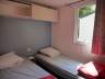 Campsite France Correze : chambre enfant du cottage loggia 2ch avec deux lits simples